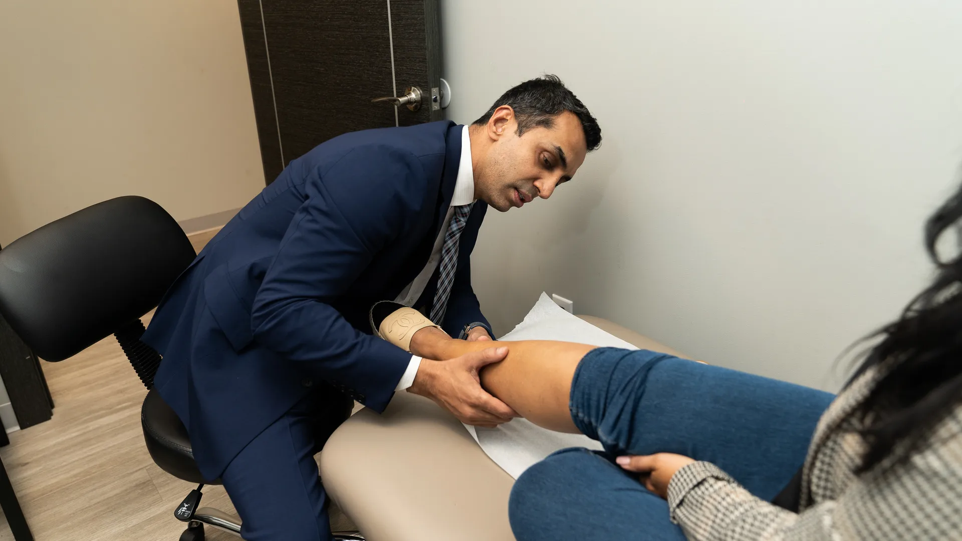 Doctor performing diagnostic examination
