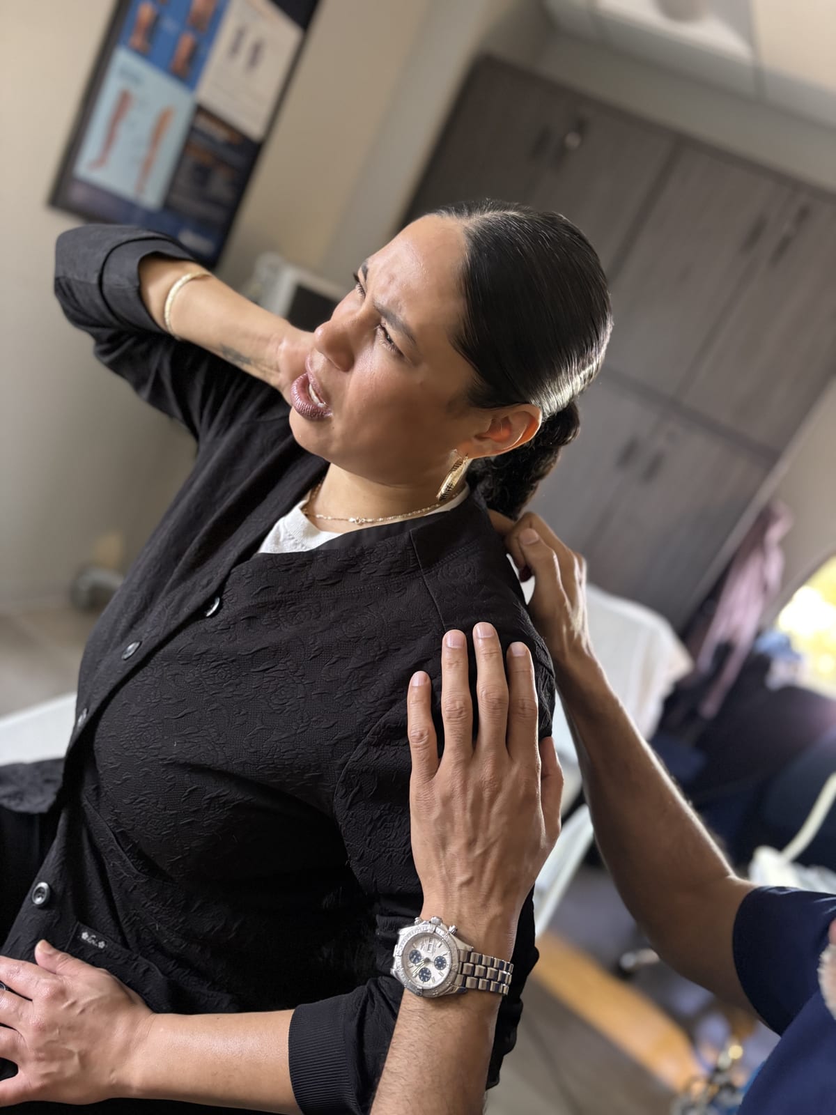 Doctor performing neck examination